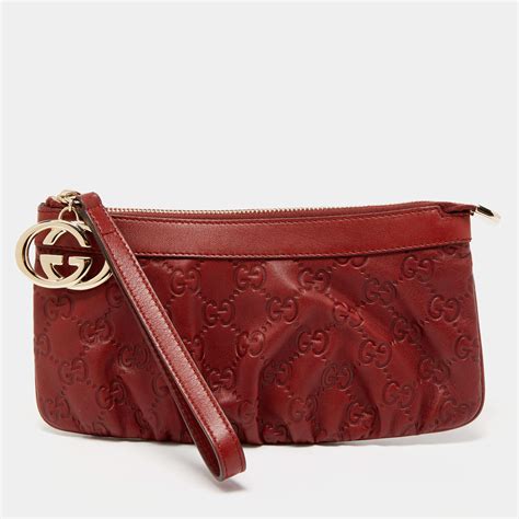 gucci guccissima wristlet red